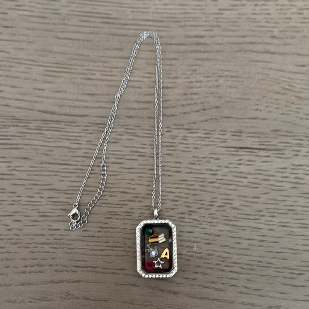 Origami locket with charms